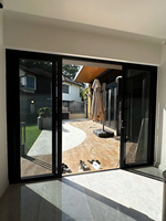 Design minimaliste double portes coulissantes en verre trempé robuste porte coulissante de balcon économe en énergie
