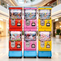 Distributeur automatique de capsules à deux niveaux pour centres de jeux, fonctionnant à monnayeur