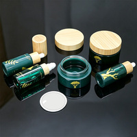 Ensemble de flacons cosmétiques en verre vert foncé écologiques et durables avec couvercle en bambou, plusieurs capacités, vente en gros, approvisionnement en vrac