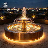 Fuente de agua circular multicolor con luces RGB de acero inoxidable, con modos de música intercambiables, para parques temáticos y zonas escénicas.