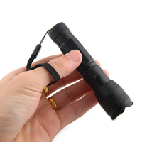 Lampe torche tactique EDC QXMOVING en aluminium, piles AA, couleur noire, 7 LED, avec lumière laser rouge pour le camping et la chasse