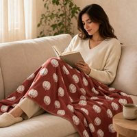 Plaid en jacquard double face 100% polyester avec ourlets triangulaires à points invisibles sur les 4 coins