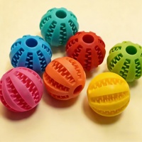 Fabricant de jouets interactifs pour animaux de compagnie OEM respectueux de l'environnement, balle magique roulante pour chien, distributeur de friandises à alimentation lente, jouet à mâcher pour chien