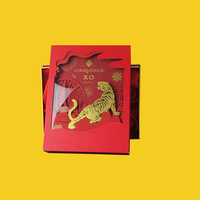 STPP a développé une boîte cadeau de luxe en papier 3D personnalisée avec impression, pour whisky/cognac, avec insert en mousse en forme de bouteille.