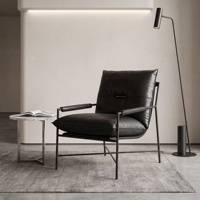 Fauteuil d'appoint moderne et minimaliste en cuir noir, fauteuil de loisirs individuel à structure métallique, chaise longue design pour salon et hôtel