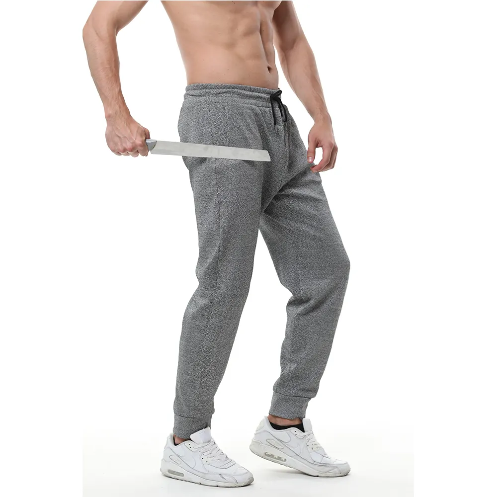 กางเกงป้องกันการตัดของผู้ชาย,กางเกงสีพื้นกางเกงป้องกันการกัดกร่อน HPPE สนามกลางแจ้งทนทานต่อการสึกหรอ