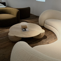 Table basse en travertin naturel véritable OEM ODM, base incurvée stable, table d'appoint en travertin pour un espace de vie contemporain et organique
