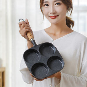 Poêle Wok en fonte à 4 trous Design classique Petit déjeuner Crêpe Omelette et Friture aux œufs Poêle à induction Applicable - Product Image 1