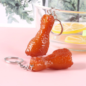 Llavero colgante creativo y realista con modelo de patas de cerdo y pollo estofadas, un artículo novedoso para tiendas de dos yuanes, perfecto para bolsos. - Product Image 1