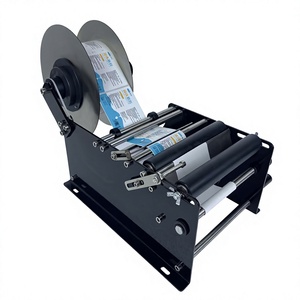 Machine d'étiquetage de bouteilles rondes manuelle semi-automatique Kuyi pour aliments et boissons, facile à utiliser et portable - Product Image 1