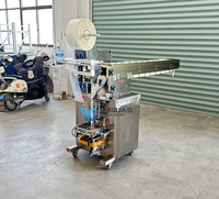 Machine d'emballage verticale à convoyeur à godets pour chips, thé, snacks, grains de café, riz, biscuits, noix, quincaillerie