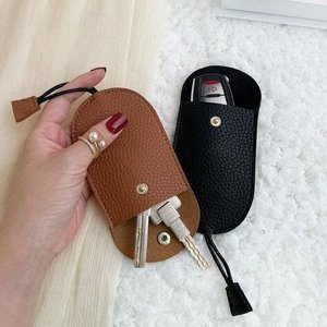 เคสกุญแจรถแบบกระดุมติดลายนูนลายลิ้นจี่พรีเมียม พร้อมถุงของขวัญ ชุด 2 ชิ้น ข้อเสนอพิเศษ BLACK FRIDAY - Product Image 1