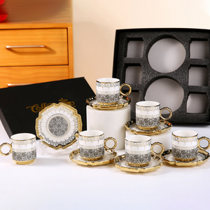 <span class=keywords><strong>2025</strong></span> Arabic trắng sang trọng gốm cốc hoa phong cách Châu Âu Bàn cà phê đặt cup khuyến mại bộ quà tặng của 6 cốc cà phê và chiếc đĩa - Product Image 1