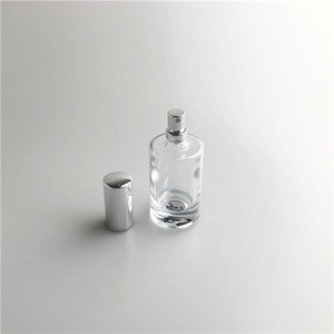 Vial de vidrio transparente portátil de 50ml Botella de perfume de muestra vacía con tapón de rosca Precio bajo Forma de cilindro de venta - Product Image 1