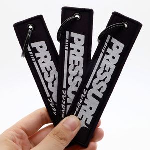 Porte-clés personnalisé avec logo et slogan imprimés pour événements culturels jeunesse et cadeaux pour la communauté des styles de vie alternatifs – Jet Tags - Product Image 1