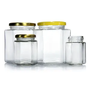 Échantillon gratuit fourni 45ml 100ml 180ml 280ml 380ml 500ml 730ml Pot en verre de miel hexagonal Pot à confiture avec couvercle