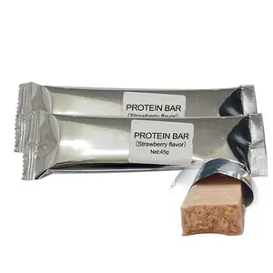 OEM campione gratuito commercio all'ingrosso di proteine del siero di latte barretta proteica organica fragola aromatizzata barrette ad alto contenuto proteico stock di nutrizione sportiva