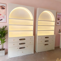 Vitrine murale moderne en MDF éclairée par LED pour produits cosmétiques, parfums et soins de beauté, présentoir de vente au détail pour salons de beauté
