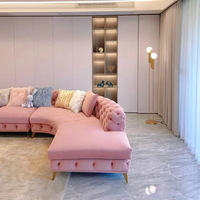 Canapé Chesterfield incurvé en forme de L avec boutons modernes Ensembles de canapés d'angle rembourrés en velours Ensemble de canapés de salon modulaires