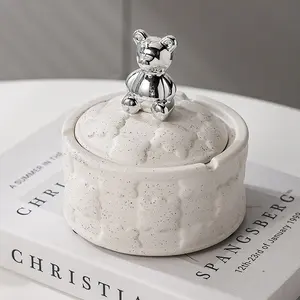 2022 new arrive Nordic light luxury bear biscuit embossed ceramic ashtray, living room anti-flying ash silver ashtray with cover
