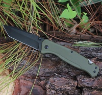 Couteau de poche tactique pliant multi-usages en acier inoxydable noir OEM pour le camping et la survie avec manche G10