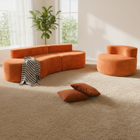 Canapé-lit d'angle orange sans structure, design créatif, avec rembourrage en éponge compressée, idéal pour appartement