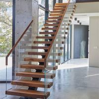 Escaliers flottants intérieurs invisibles avec bande de roulement en bois de chêne blanc de 40mm