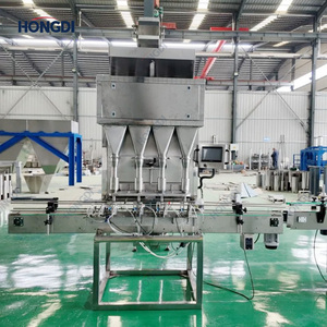 Línea de Embotellado de Gránulos Totalmente Automática con Elevador en Forma de Z, Pesadora Lineal de 4 Cabezas, Desenredador de Botellas, Tapadora y Acumulador - Product Image 5