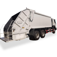 Camion à ordures compacteur diesel manuel Sinotruck HOWO 20CBM 6x4 avec boîte de vitesses SINOTRUK et moteur 340PS