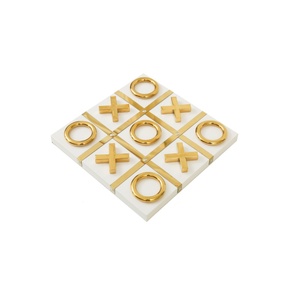 Juego de Tres en Raya de Lujo con Acabado Dorado, Base Negra Elegante, Juego de Ajedrez Decorativo XO - Product Image 1