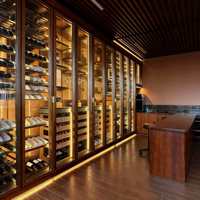 Nouveauté : Armoire à vin de luxe en métal avec éclairage LED et porte-bouteilles
