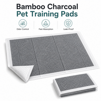 Vente en gros de tapis d'apprentissage pour animaux de compagnie en charbon de bambou, contrôle des odeurs, absorption rapide, tapis de propreté pour chiots, fourniture d'usine