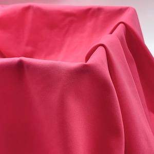 Tejido de urdimbre de alta elasticidad desnudo para traje de baño de Bikini deportivo tela de nailon semibrillante con función elástica - Product Image 1