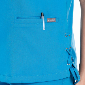 เซ็ตกางเกงสำหรับผู้หญิงชุดบอดี้สูทสีสครับสีฟ้าเข้มแขนสั้น OEM สไตล์ใหม่ - Product Image 5