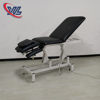Xinman 2 Réglage de la hauteur du moteur Lit de beauté électrique Lit de traitement Lit de massage Conception de contrôle des pieds