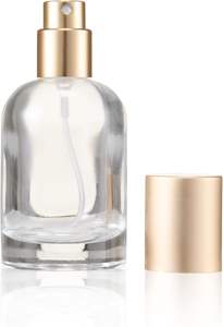 Vente en gros Bouteille de luxe en verre de parfum vide de forme ronde avec bouchon transparent en argent 30ml 50ml 100ml - Product Image 3