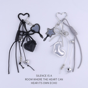 Ins Style Porte-clés Coeur Étoile Arc Tassel Pendentif Métal Cuir Niche Design Sac Accessoire - Product Image 1