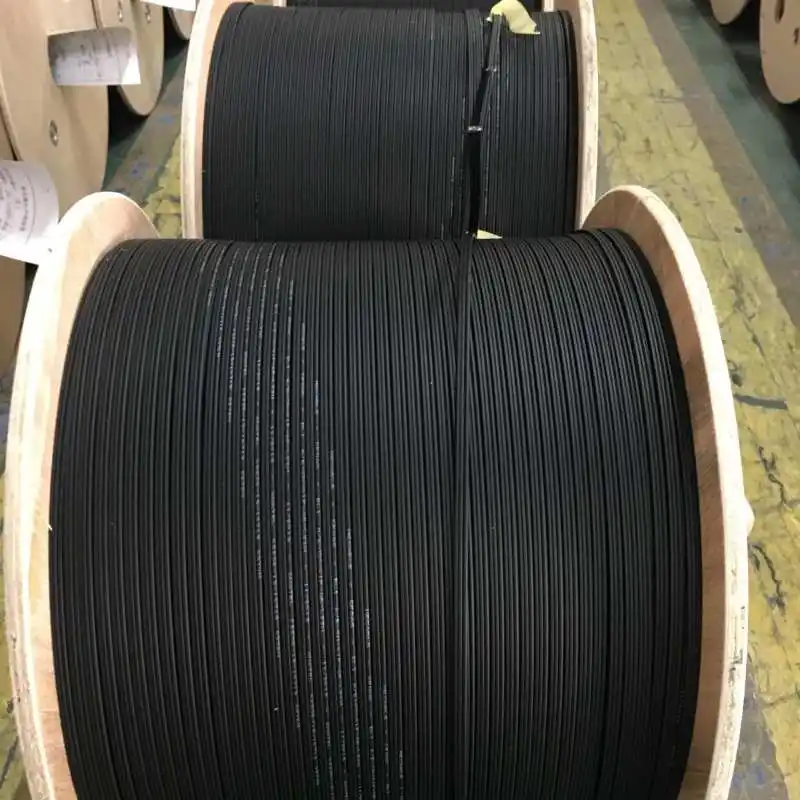 FCJ fábrica GJYXCH cabo de madeira compensada de tambor de 1km 2km cabo de fibra óptica de modo único cabo de gota FTTH com mensageiro 2 núcleos de fibra