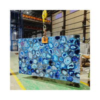 Panneau mural rétro-éclairé en agate d'onyx bleu semi-précieux pour comptoir mural