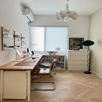 Meuble de rangement tout-en-un couleur crème pour livres et dossiers, avec tiroirs coulissants personnalisés, idéal pour studio, appartement, ou coin de vie et de travail polyvalent