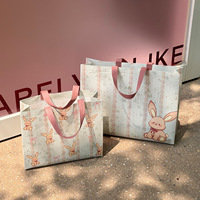 Sac cadeau robuste en non-tissé DLBZ avec motif de lapin de dessin animé mignon, logo personnalisé, sac de shopping de luxe, sac fourre-tout en tissu réutilisable