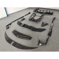 Kit de carrosserie en fibre de carbone sèche style OEM : lames avant et arrière, jupes latérales, couvre-aileron arrière, etc. pour Lamborghini Revuelto