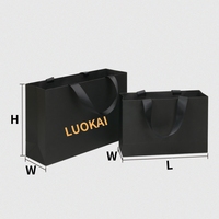 Mini sac en papier de luxe blanc noir avec logo imprimé personnalisé avec poignées en ruban Petit sac cadeau de porte de mariage fantaisie pour promotions