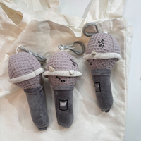 En gros, Pendentif microphone en peluche mignon de dessin animé avec visage souriant, rembourrage en polyester et coton PP, cadeau pour machine à griffes