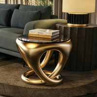 Table d'appoint en métal moulé au design unique, idéale pour les bureaux à domicile et les salons d'hôtel, un choix privilégié pour les tables basses.