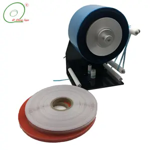 Dispensador de cinta para sujetar cinta de sellado de bolsas de carretes de bobina