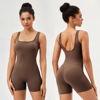 D42158 Yoga Onessuit avec coussin de poitrine pour les femmes corps nu serré hanche levage combinaisons course sport Yoga costume