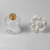 Diffuseur de parfum d'ambiance en cire parfumée à la fleur de porcelaine, fait main, en bouteille de verre de 50 ml, pour la maison