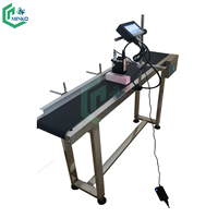 Imprimante jet d'encre automatique personnalisée et machine de codage laser UV pour l'impression de la date de production sur ligne de convoyeur d'œufs à vitesse variable