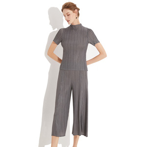 Abbigliamento donna moda pendolarismo italiano da donna a due pezzi a maniche corte a gamba larga Set pantaloni lunghi Casual da donna - Product Image 1
